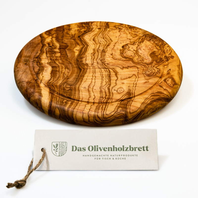 Schneidebrett aus Olivenholz rund mit Saftrille